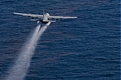 BP Oil Spill C-130 Dispersant Spraying Aircraft - Stock Photo high definition stock photo - BP Oil Spill C-130 Dispersant Spraying Aircraft - Stock Photo
