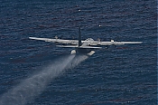 BP Oil Spill Oil Dispersant Spray Aircraft - Stock Photo high definition stock photo - BP Oil Spill Oil Dispersant Spray Aircraft - Stock Photo