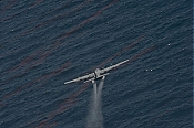 USAF Hercules Oil Dispersant Spray Aircraft - BP - Stock Photo high definition stock photo - USAF Hercules Oil Dispersant Spray Aircraft - BP - Stock Photo