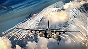 US Air Force AC-130U Gunship Picture - Firing Flares - Royalty Free - Stock Photo high definition stock photo - US Air Force AC-130U Gunship Picture - Firing Flares - Royalty Free - Stock Photo